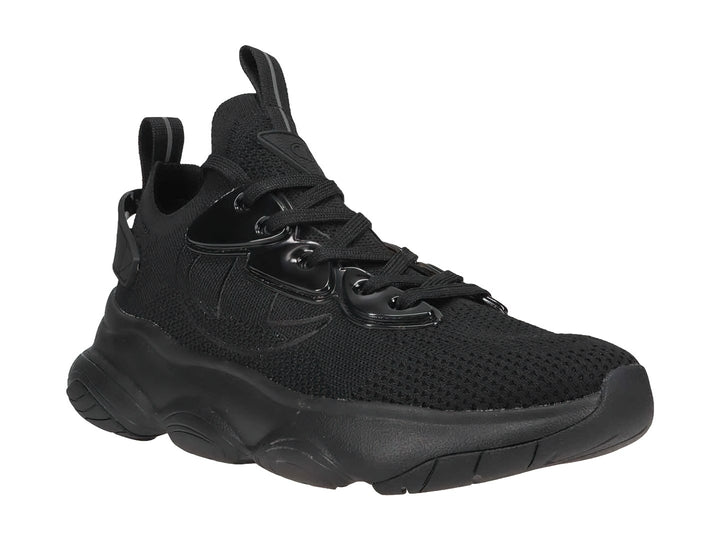 Tenis deportivos Champion color negro con suela ancha y detalles brillantes, diseñados para niños.