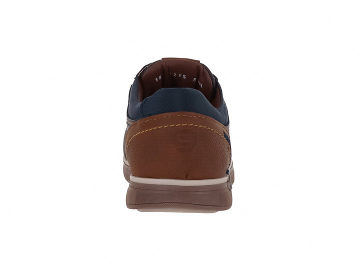 Zapato casual para Niño en color azul marino con detalles y suela en color café.