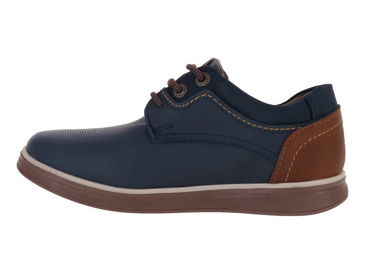 Zapato casual para Niño en color azul marino con detalles y suela en color café.