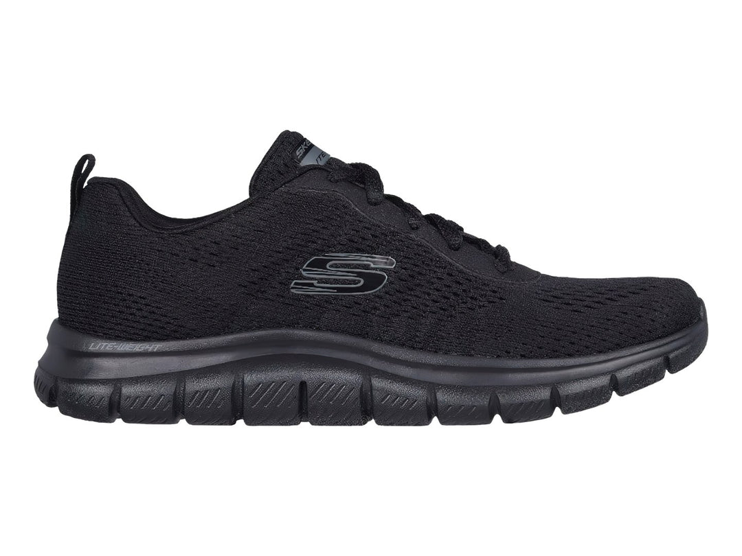 Tenis deportivos Skechers color negro con suela flexible y tejido transpirable.