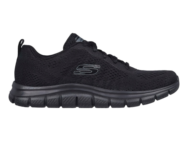 Tenis deportivos Skechers color negro con suela flexible y tejido transpirable.