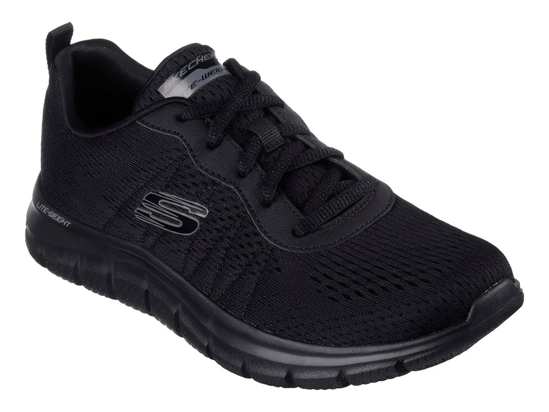 Tenis deportivos Skechers color negro con suela flexible y tejido transpirable.