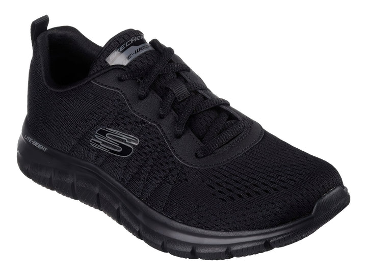 Tenis deportivos Skechers color negro con suela flexible y tejido transpirable.