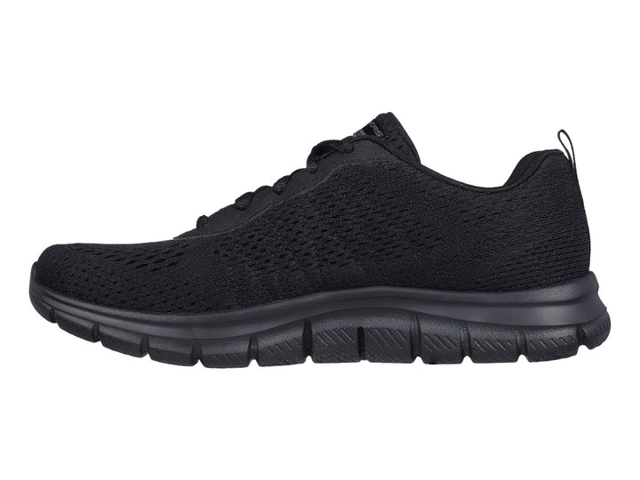 Tenis deportivos Skechers color negro con suela flexible y tejido transpirable.