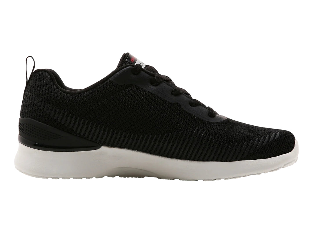 Tenis deportivos Skechers color negro con suela blanca y detalles en malla.