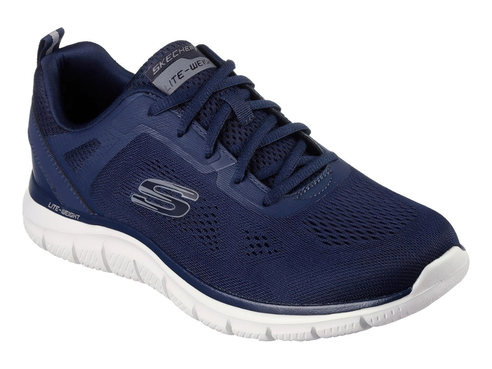 Tenis deportivos Skechers en color azul marino con suela blanca y detalles en malla.