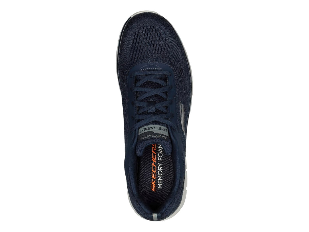 Tenis deportivos Skechers en color azul marino con suela blanca y detalles en malla.