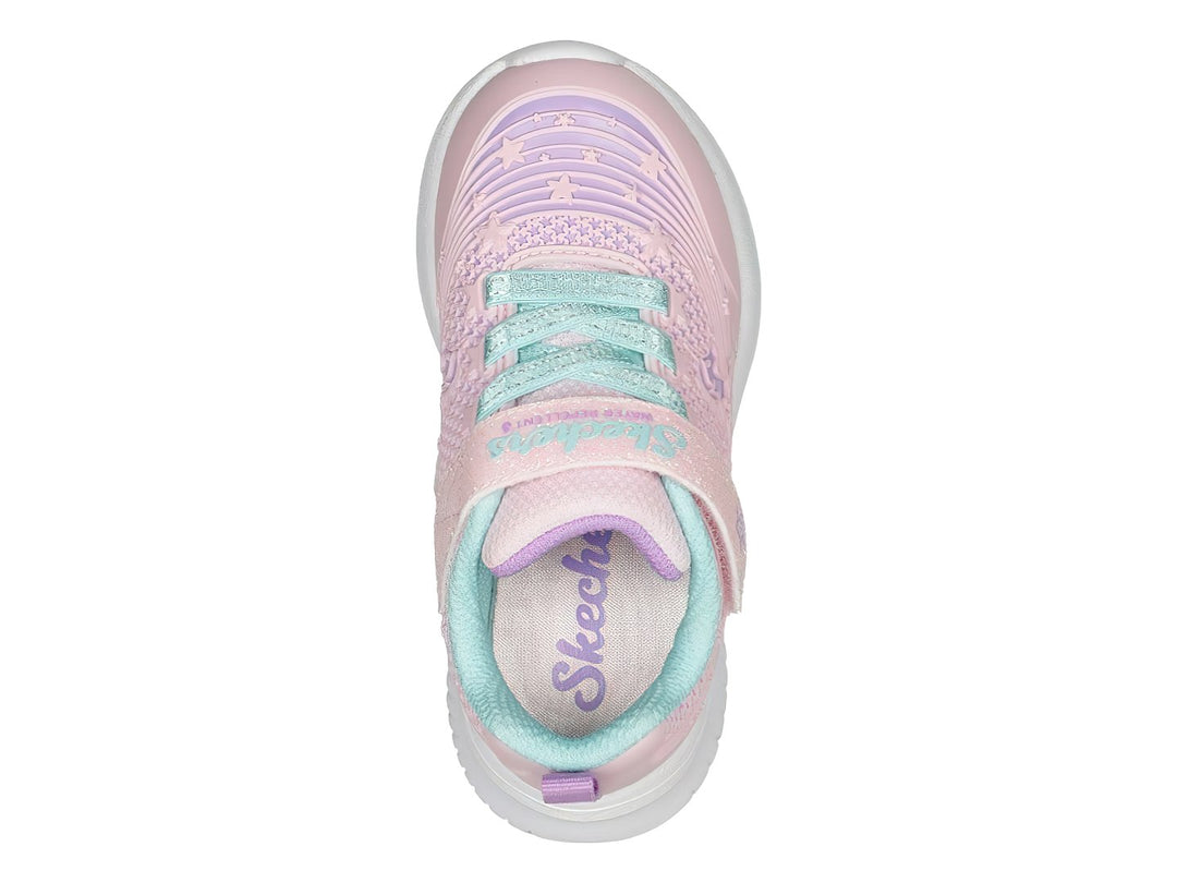 Tenis deportivos SKECHERS para Niña en color rosa con diseño de unicornio y suela blanca.