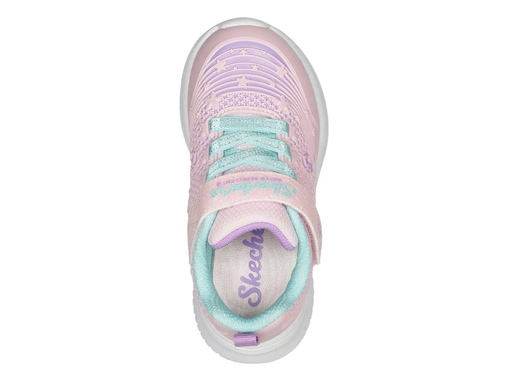 Tenis deportivos SKECHERS para Niña en color rosa con diseño de unicornio y suela blanca.