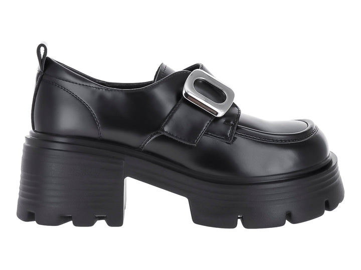 Zapato negro de plataforma con hebilla plateada y suela track gruesa para mujer.