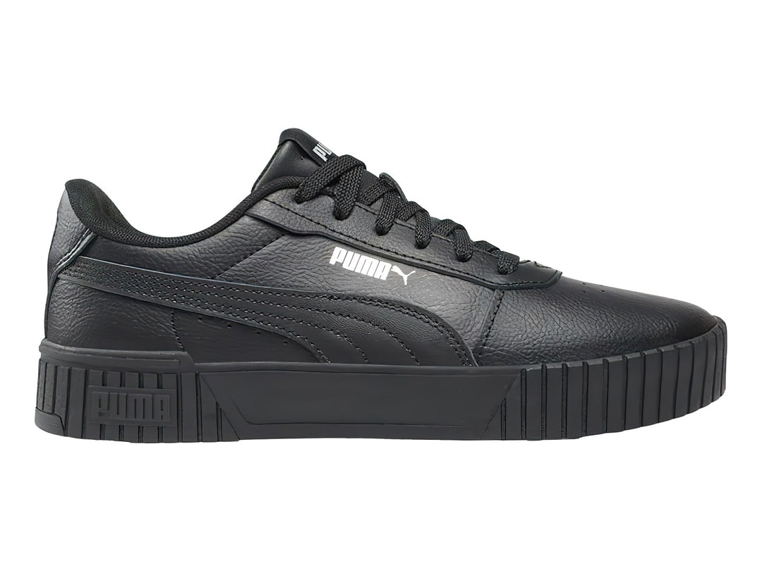 Tenis PUMA Carina 2.0 JR en color negro con detalles en plata y suela de plataforma.