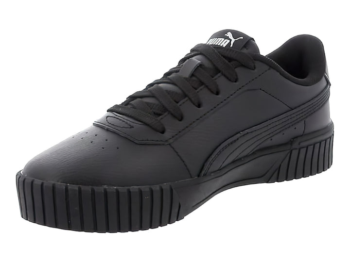 Tenis PUMA Carina 2.0 JR en color negro con detalles en plata y suela de plataforma.