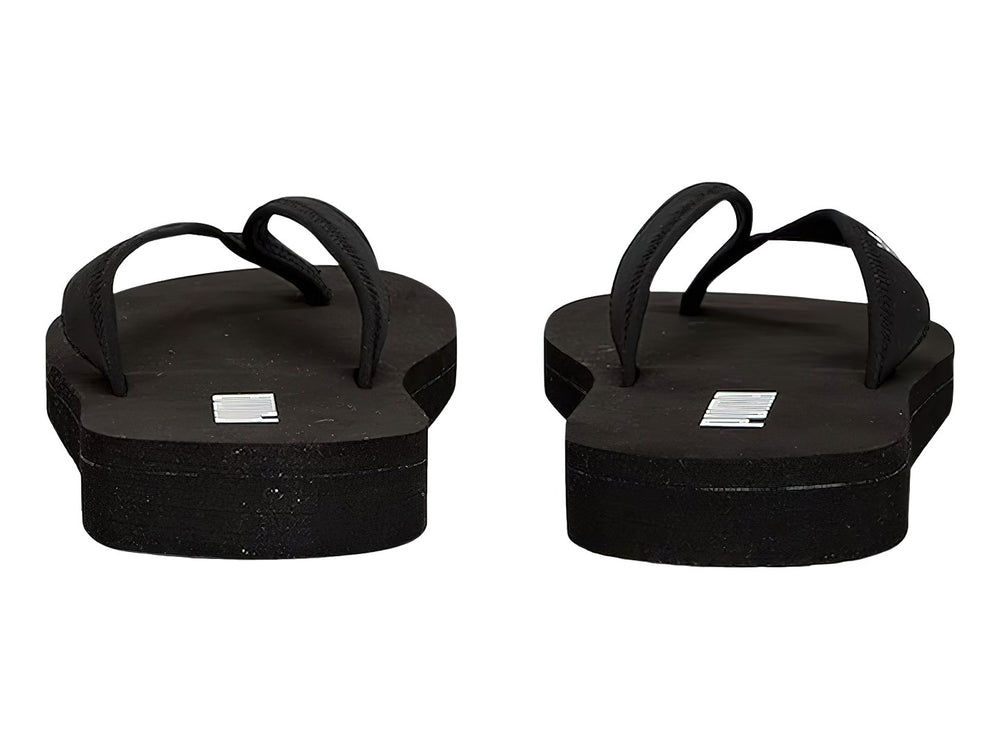 Sandalias tipo flip-flop PUMA en color negro con logotipo blanco en la plantilla.