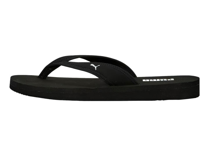 Sandalias tipo flip-flop PUMA en color negro con logotipo blanco en la plantilla.