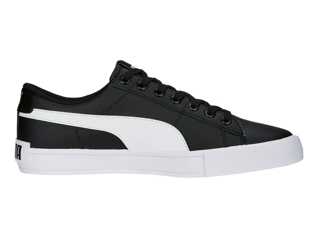 Tenis PUMA BARI CASUAL color negro con franja lateral y suela blanca.