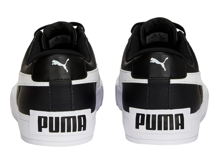 Tenis PUMA BARI CASUAL color negro con franja lateral y suela blanca.