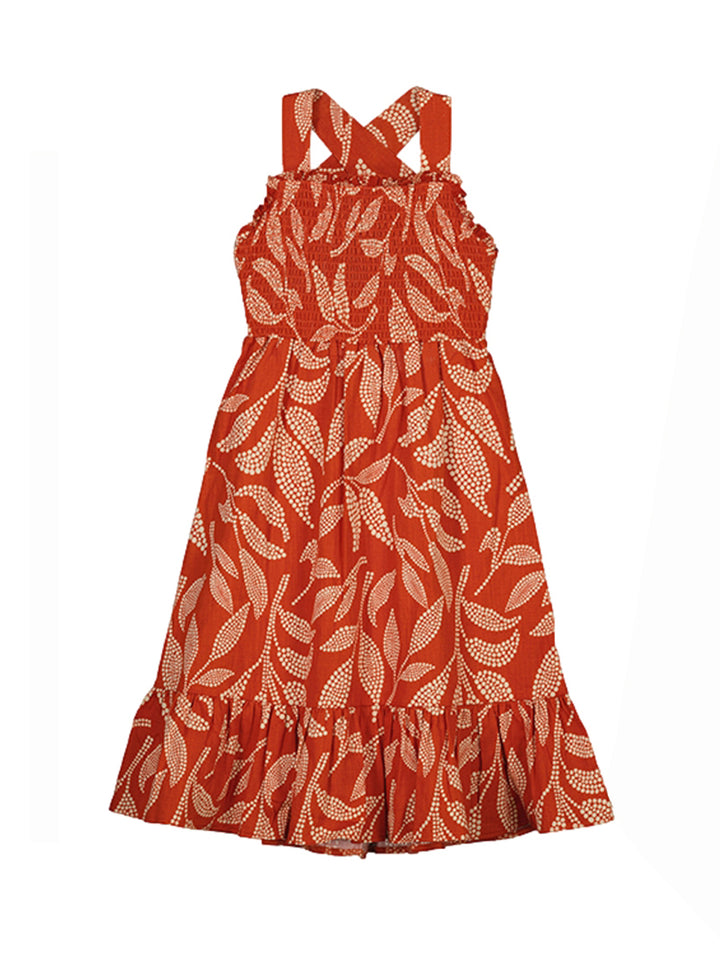 Vestido midi color teja con estampado blanco, tirantes cruzados y detalle de volante en el ruedo para niña.