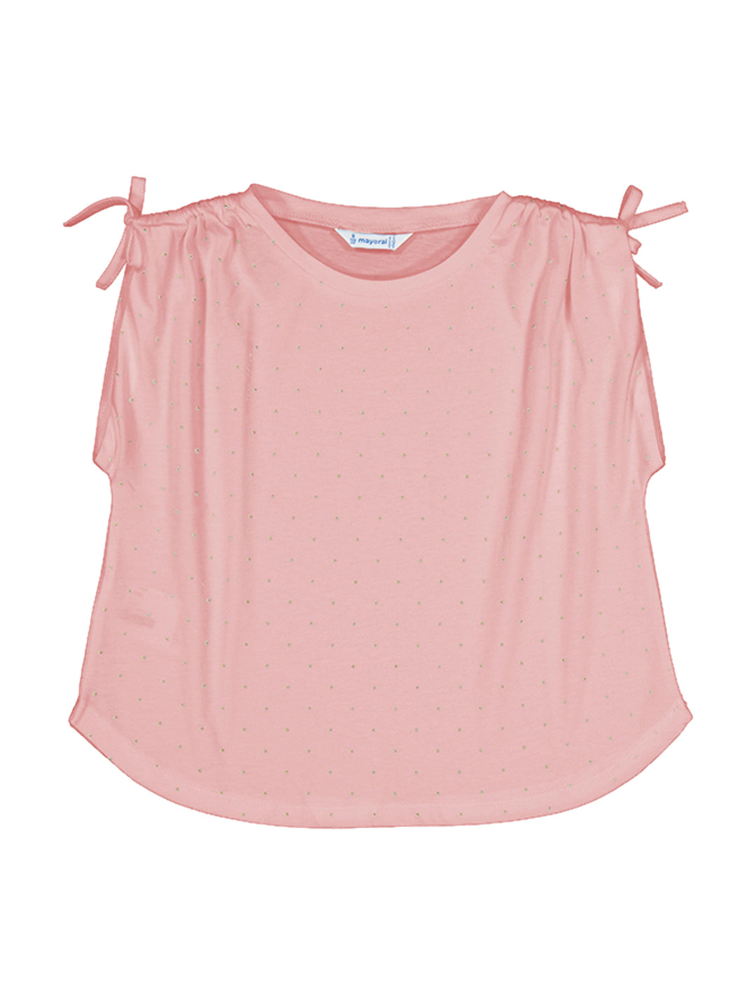 Camiseta rosa cuarzo para niña con tirantes decorados con lazos y estampado de pequeños puntos.