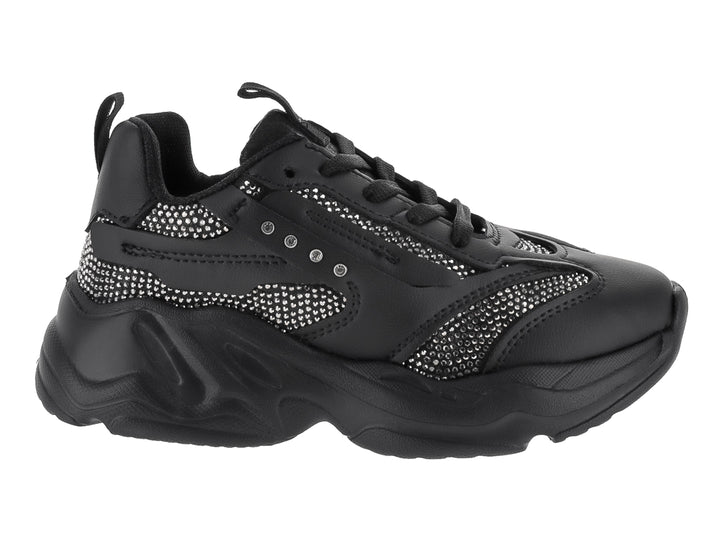 Tenis deportivos infantiles color negro con suela chunky y detalles en malla.