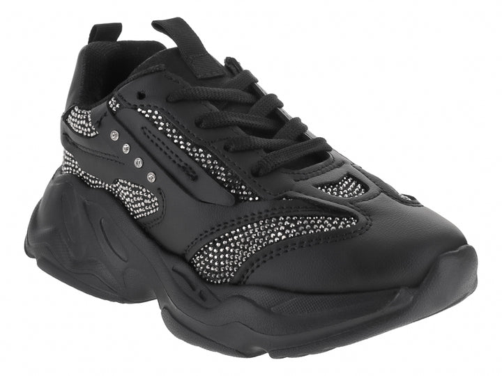 Tenis deportivos infantiles color negro con suela chunky y detalles en malla.