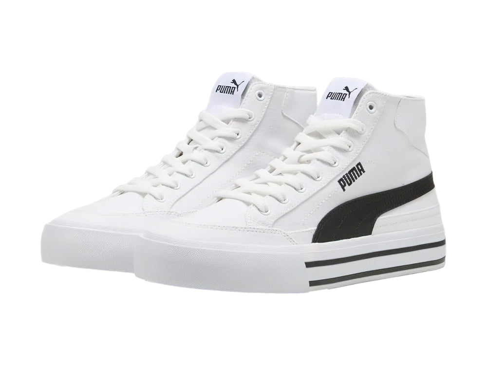 Tenis PUMA blancos de caña alta con franjas negras en la suela.
