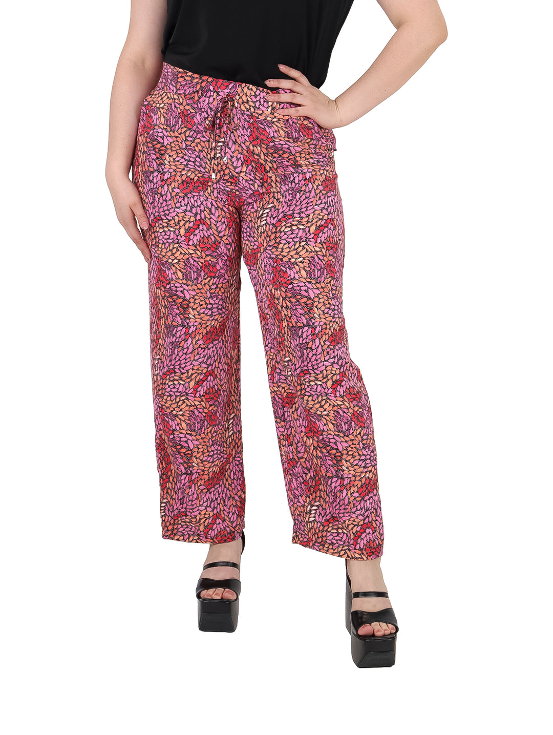 Pantalón ancho para mujer con estampado multicolor en tonos fiushia y naranja.