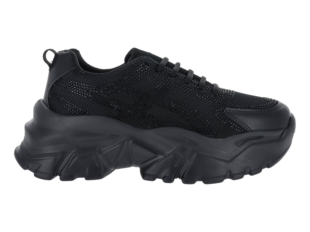 Tenis deportivos color negro con suela gruesa y diseño moderno de la marca Andrax.