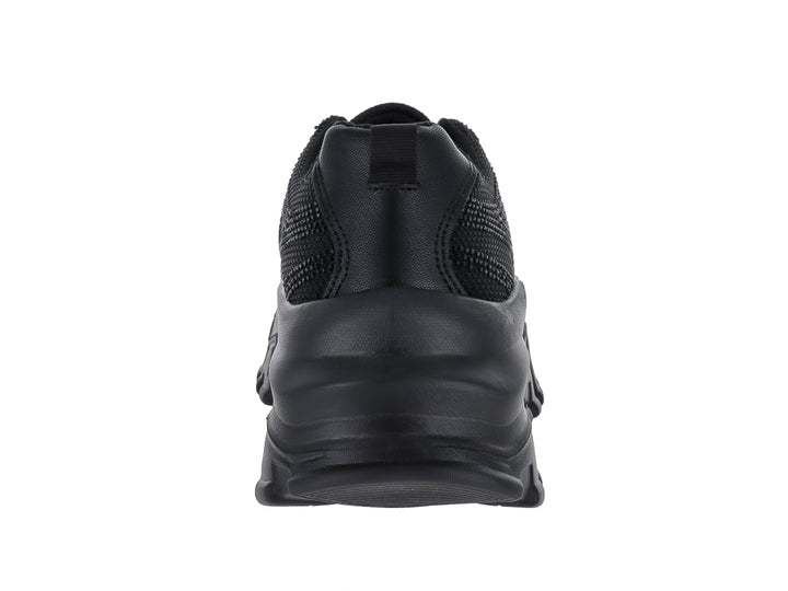 Tenis deportivos color negro con suela gruesa y diseño moderno de la marca Andrax.
