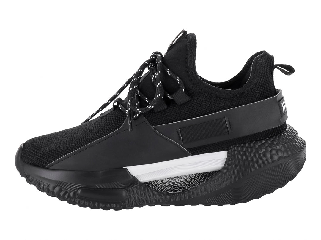 Tenis de baloncesto Andrax color negro con detalles blancos y suela robusta.