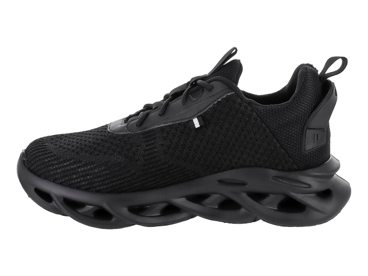 Tenis deportivos color negro con suela gruesa esculpida y tejido de malla.