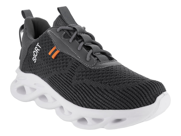 Tenis deportivos Andrax en color gris oxford con suela blanca gruesa y detalles en naranja.