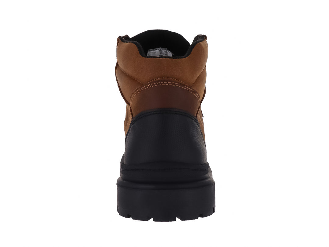 Botas color miel con detalles en negro y suela gruesa dentada para hombre.