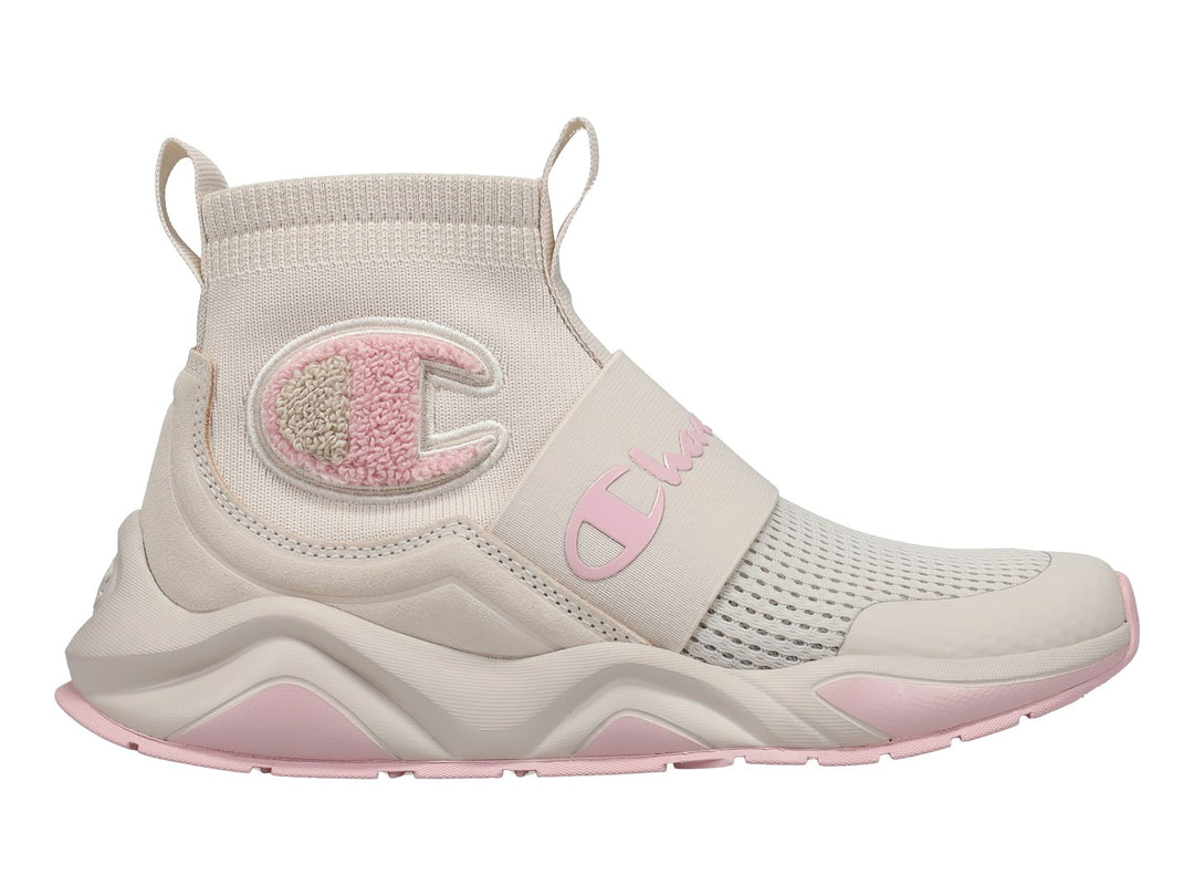 Tenis Champion Rally Pro en color beige con detalles en rosa, diseño tipo calcetín y suela robusta.