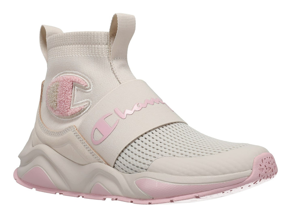 Tenis Champion Rally Pro en color beige con detalles en rosa, diseño tipo calcetín y suela robusta.