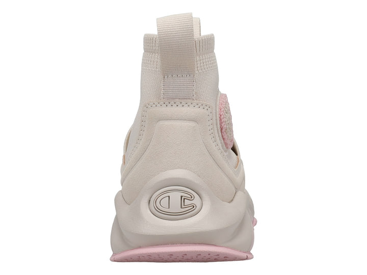 Tenis Champion Rally Pro en color beige con detalles en rosa, diseño tipo calcetín y suela robusta.