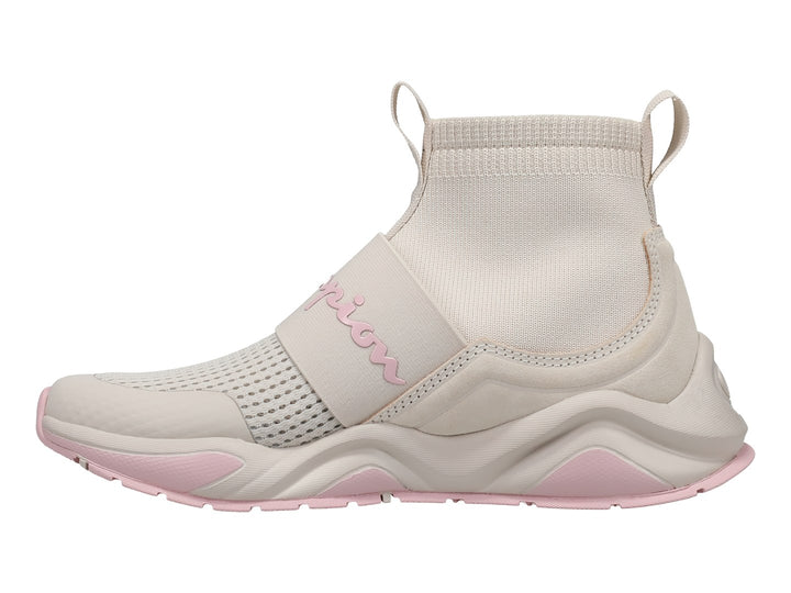 Tenis Champion Rally Pro en color beige con detalles en rosa, diseño tipo calcetín y suela robusta.