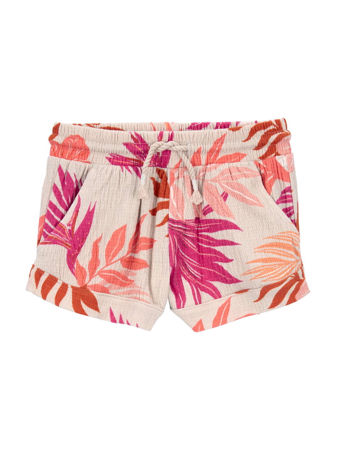 Shorts infantiles beige con estampado de hojas tropicales en tonos rosa y naranja.