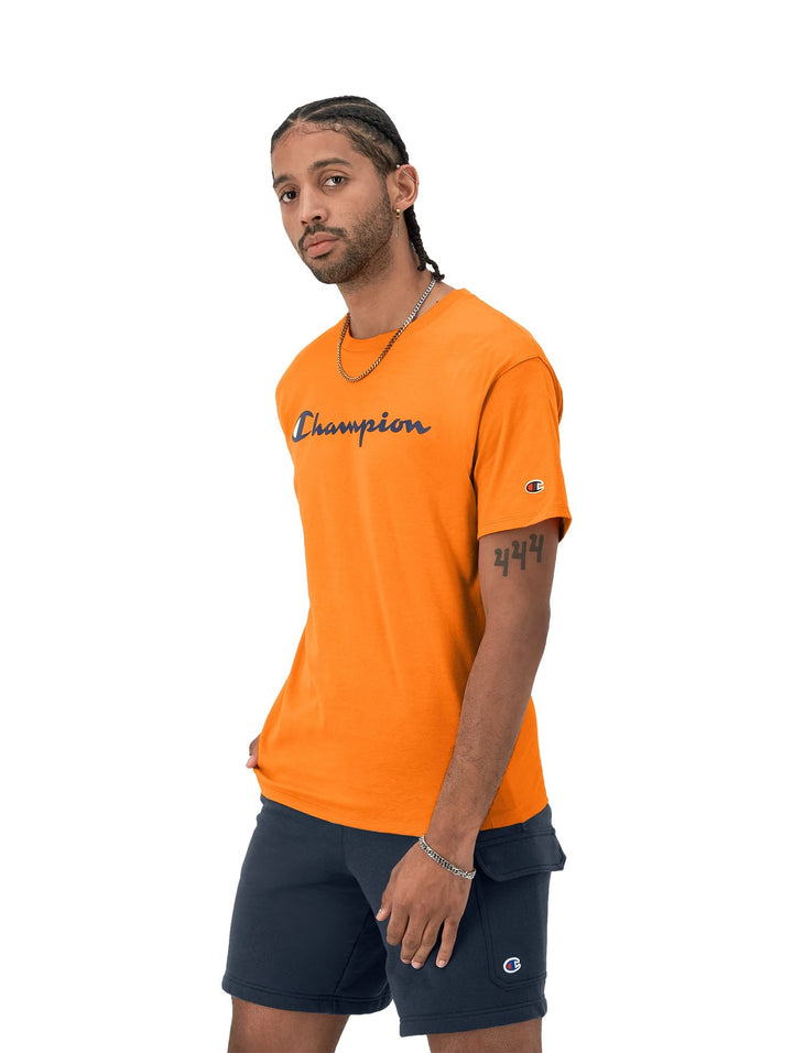Camiseta de manga corta color naranja con logotipo de Champion en el pecho.