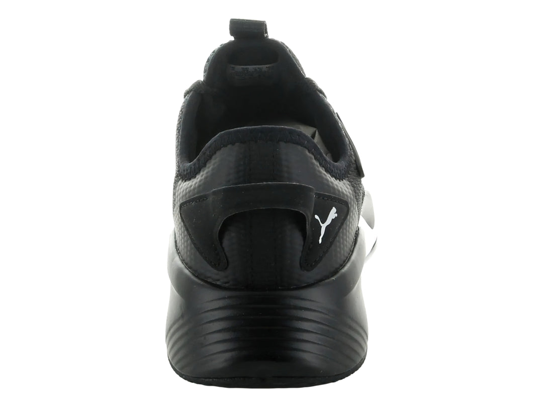 Tenis deportivos PUMA Retaliate 2 en color negro con suela blanca y logotipo plateado lateral.