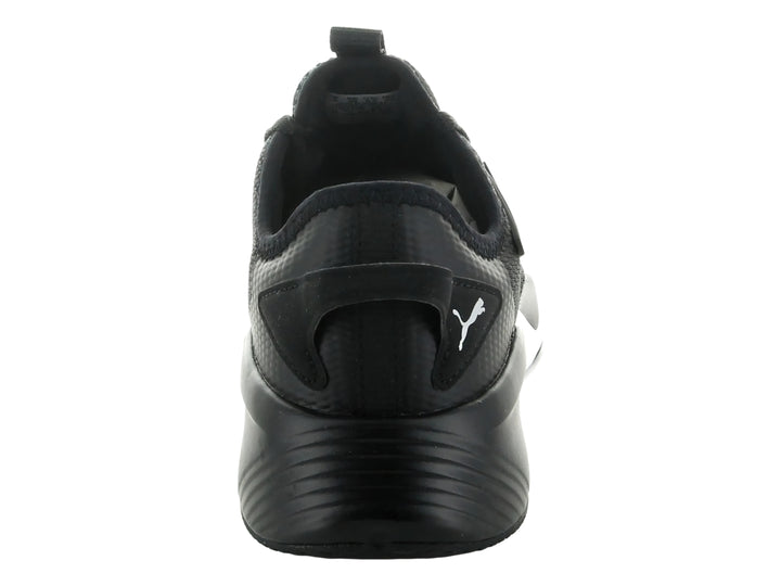 Tenis deportivos PUMA Retaliate 2 en color negro con suela blanca y logotipo plateado lateral.