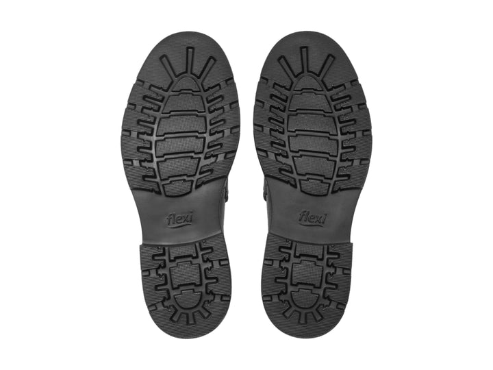 Zapato loafer de cuero negro para Hombre con suela gruesa y detalle de hebilla.