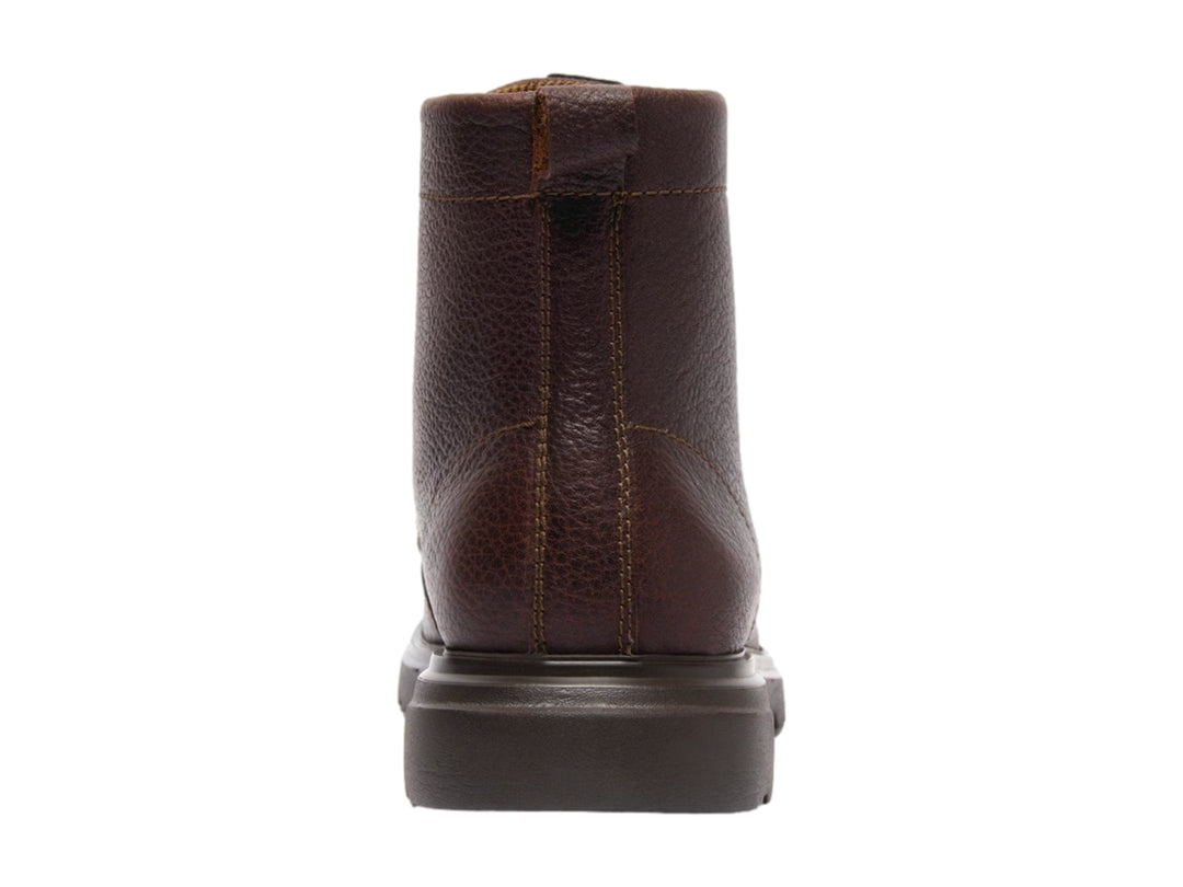 Bota de cuero color marrón oscuro con agujetas y suela gruesa.