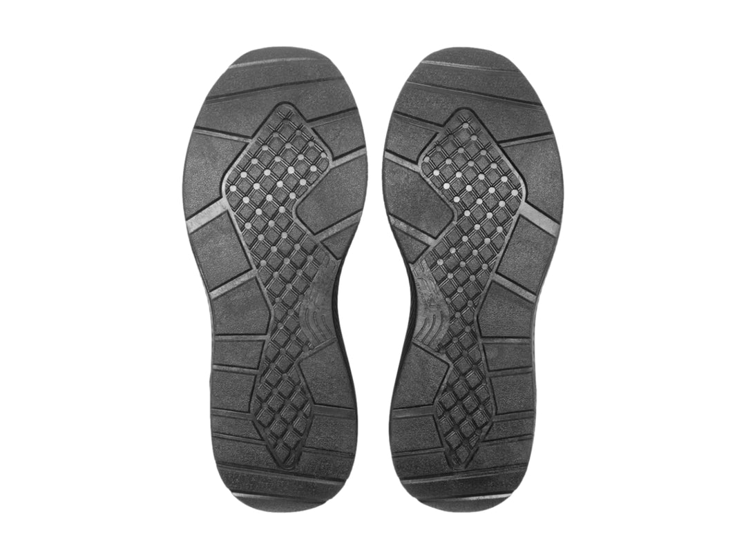 Tenis deportivos Flexi color negro con tejido textil y suela gruesa.