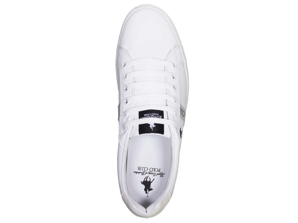Tenis blancos de The Polo Club con logotipo negro y suela plana.