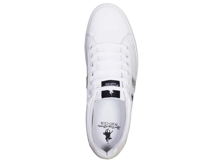 Tenis blancos de The Polo Club con logotipo negro y suela plana.