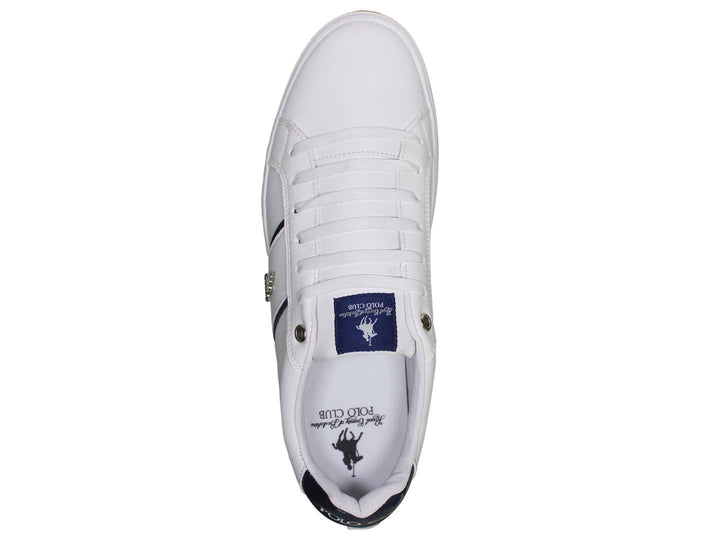 Tenis blancos THE POLO CLUB con detalles en negro en el talón y lengüeta.
