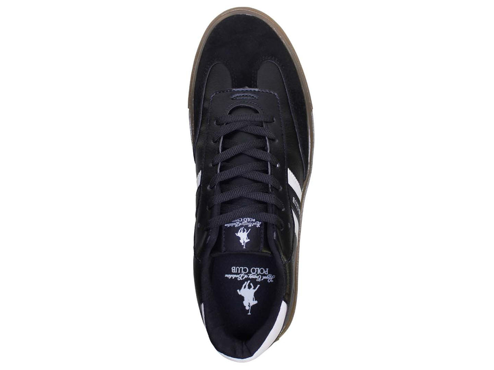 Tenis negros The Polo Club con franjas blancas laterales y suela color miel.
