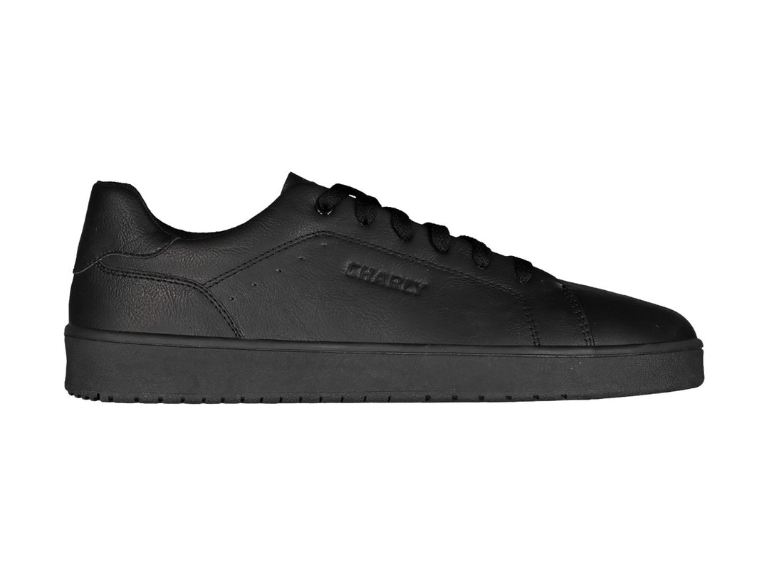 Tenis Charly color negro, estilo casual deportivo con suela plana y cordones.