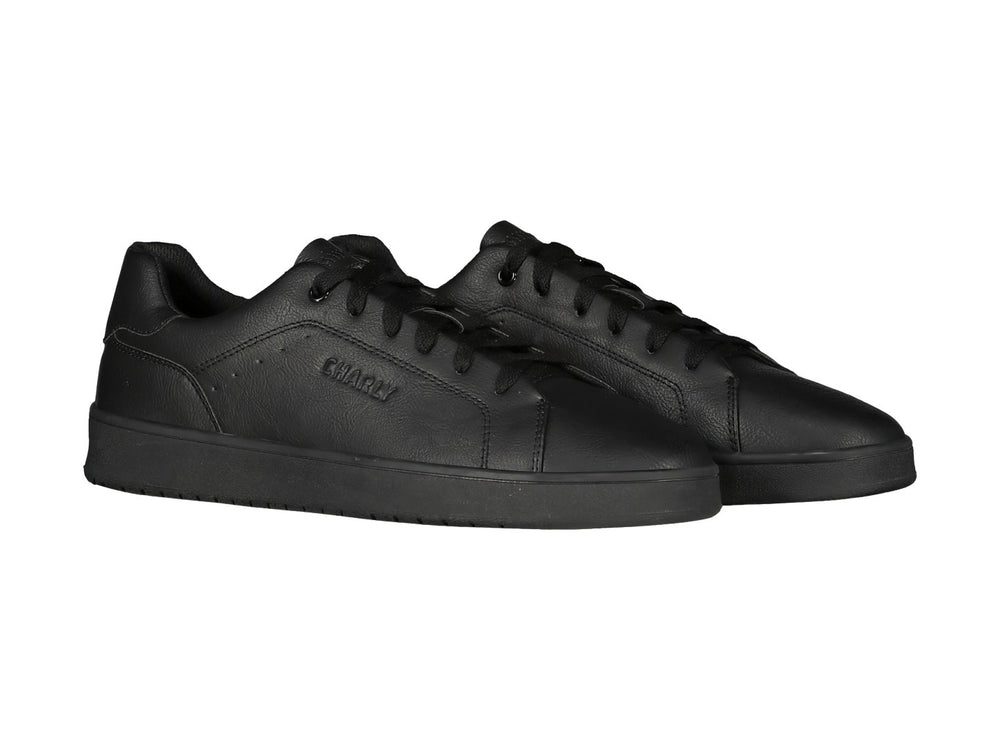 Tenis Charly color negro, estilo casual deportivo con suela plana y cordones.