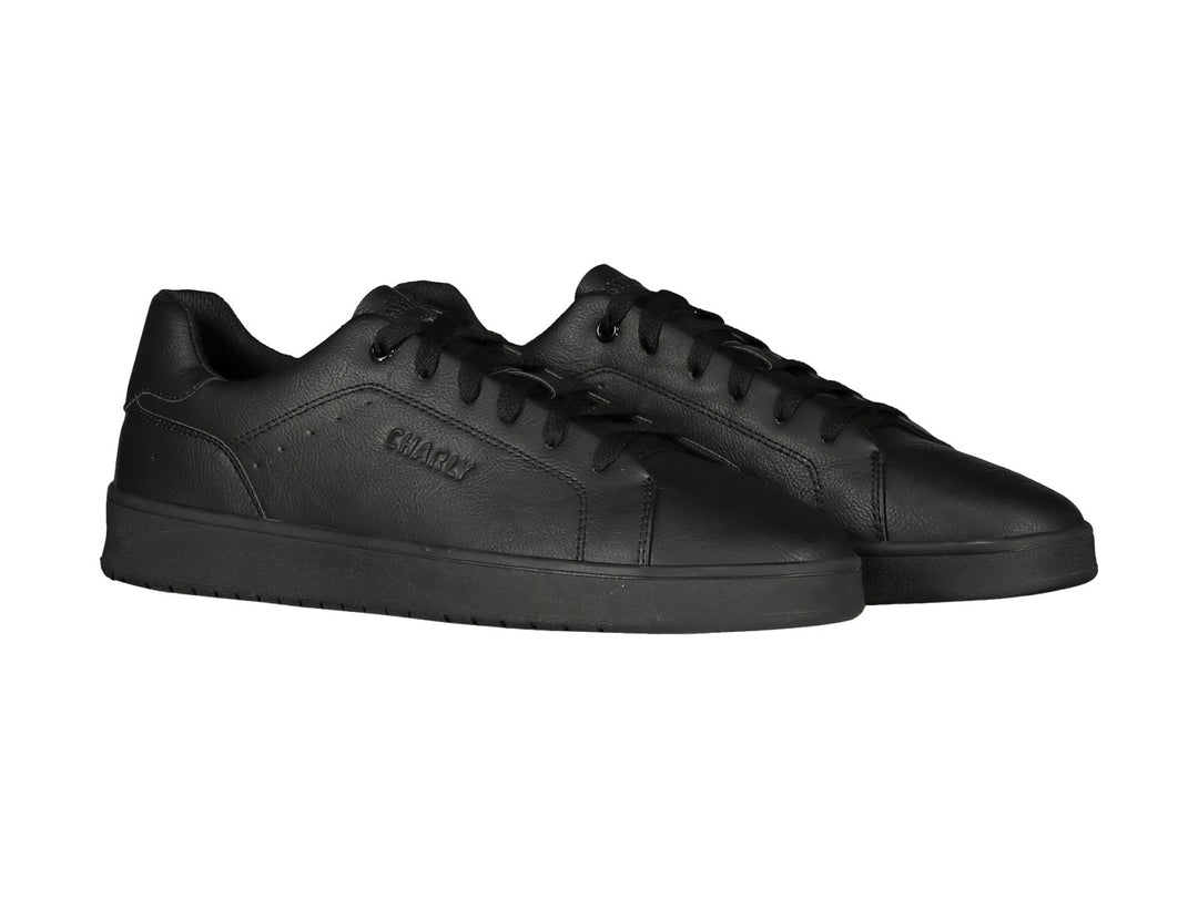 Tenis Charly color negro, estilo casual deportivo con suela plana y cordones.